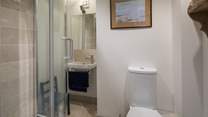 This ground floor shower-room is adjacent to the playroom/snug, which is behind the kitchen.