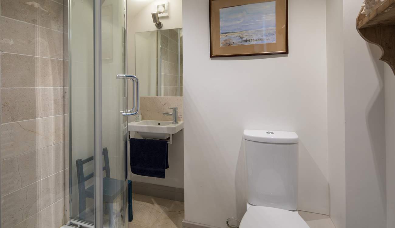 This ground floor shower-room is adjacent to the playroom/snug, which is behind the kitchen.