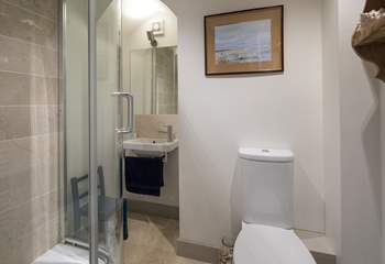 This ground floor shower-room is adjacent to the playroom/snug, which is behind the kitchen.