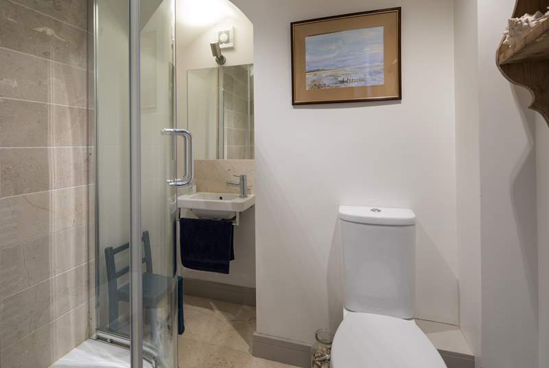 This ground floor shower-room is adjacent to the playroom/snug, which is behind the kitchen.