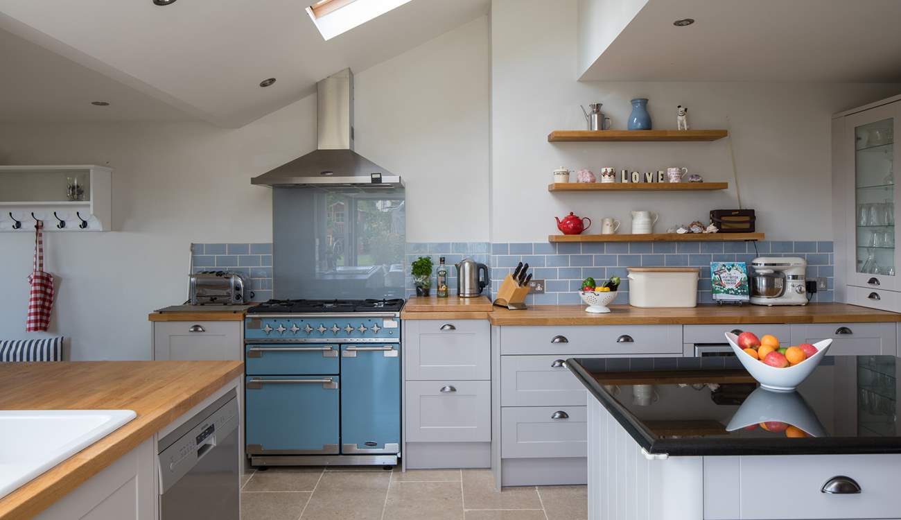 The fully equipped kitchen has a wonderful range cooker and all you need for holiday feasts.