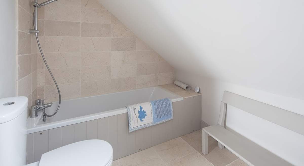 Th en suite bathroom for bedroom 3, great for soaking sandy children.