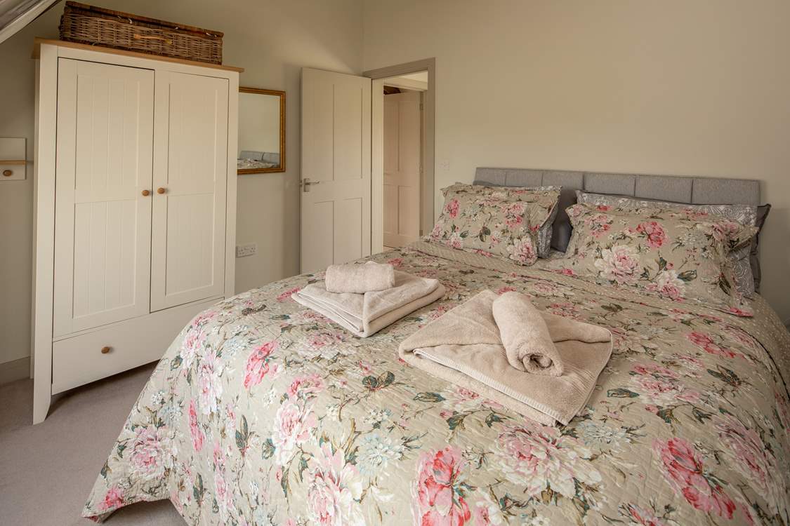 Bedroom 2 has sloping ceilings and a 6ft super-king size bed can be split into two 3ft single beds.