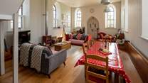 The beautiful sitting-room is flooded with light.
