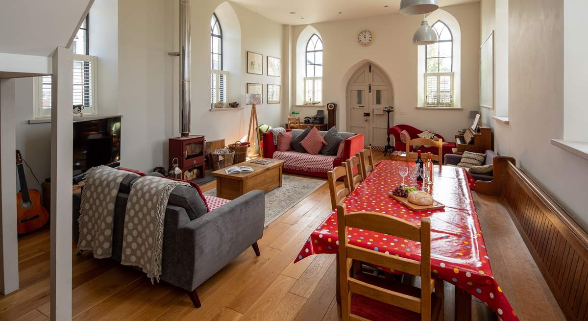 The beautiful sitting-room is flooded with light.