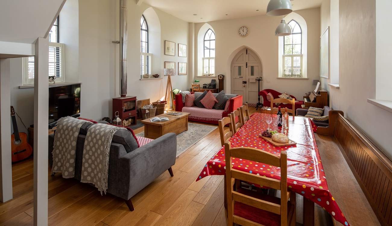 The beautiful sitting-room is flooded with light.