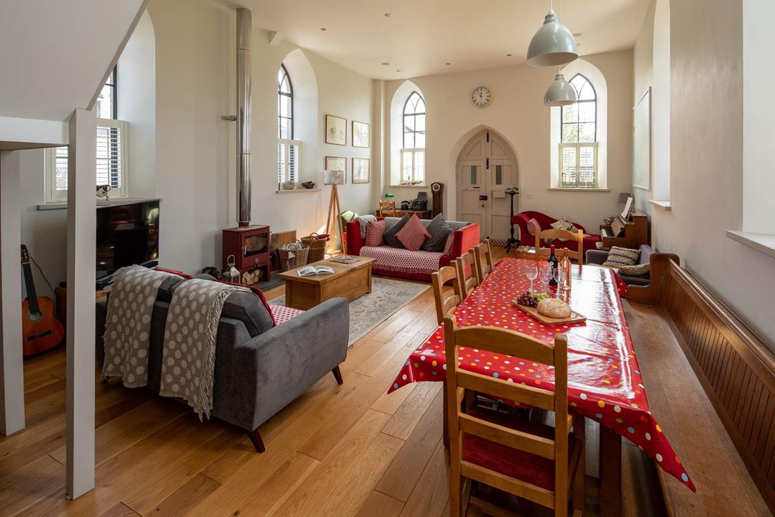 The beautiful sitting-room is flooded with light.