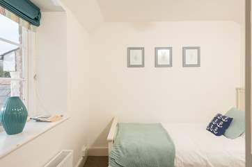 Bedroom 3 has a single bed (and space for a cot).