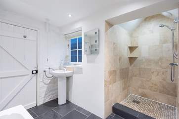 The ground floor family bathroom has a walk-in shower.