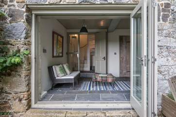 The garden room is such a lovely place to relax and unwind. Allowing you to enjoy the outside, from the comfort of being inside.
Please take care when negotiating the steps in and out of the garden room.