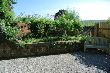 Another beautiful spot within the garden to sit back and relax in with a good book.