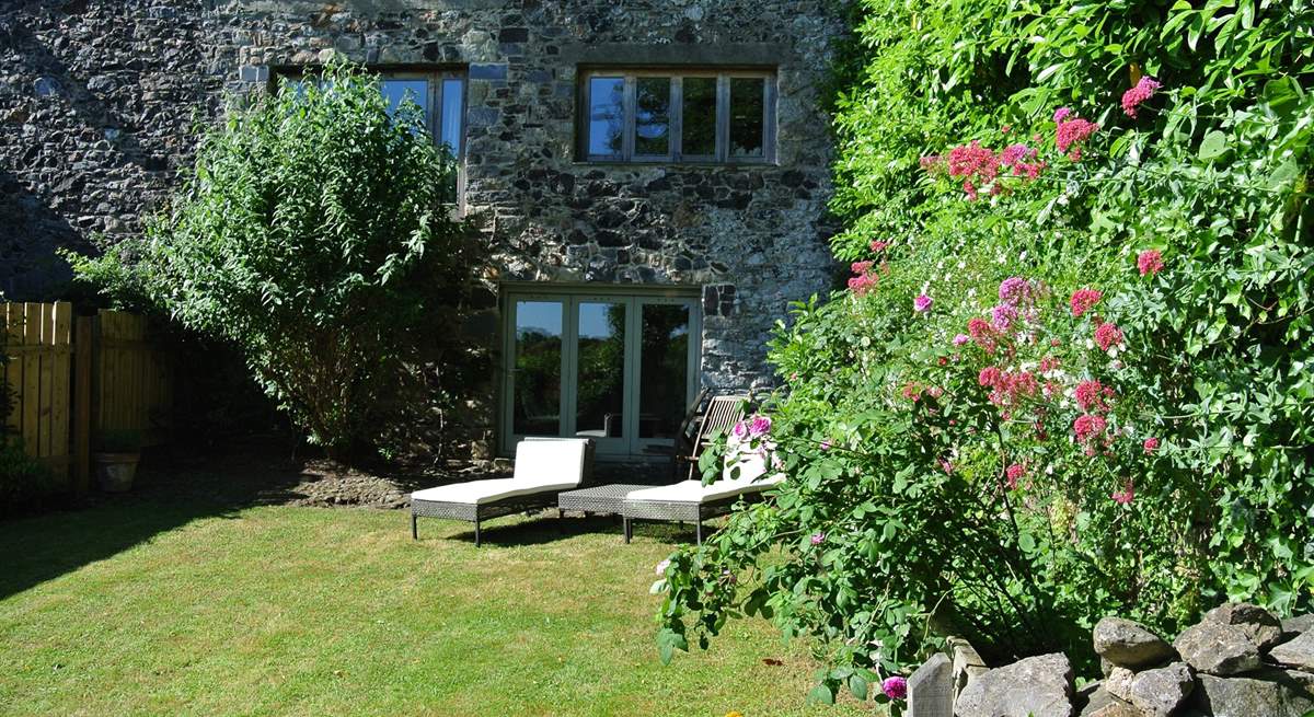 Looking back at the cottage from the end of the garden.