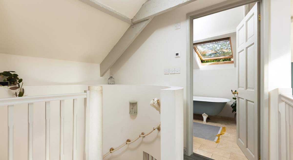 Peeking into the en suite and down the spiral staircase from bedroom two.