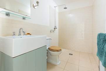 Bedroom one links to this fabulous wet-room shower room ensuite.