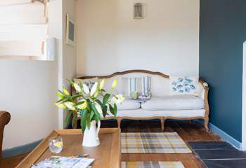 Snuggle up on the sofa or simply slip away into this private corner with a good book.