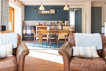 Looking into the kitchen and beyond from the living room.