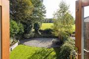 Stunning views over the garden and out over the rolling countryside can be enjoyed from the living areas.