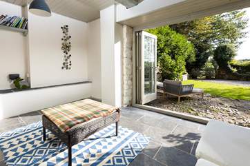 Step out of this beautiful garden room into your fully enclosed garden. Please mind the slight step.