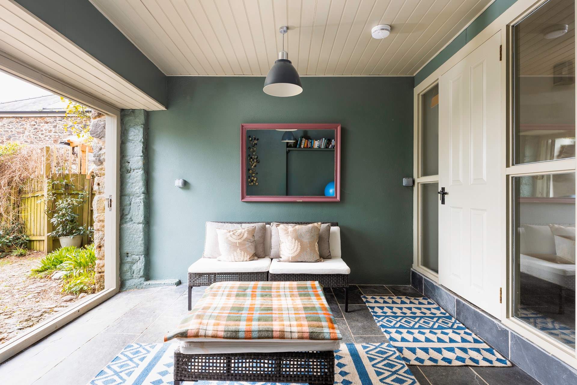 Step out of this beautiful garden room into your fully enclosed garden. Please mind the slight step.