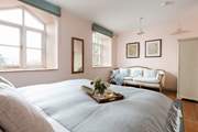 Bedroom one offers oodles of space and luxurious touches. This super-king bed also splits into two single beds, offering you extra flexibility when it comes to sleeping arrangements.