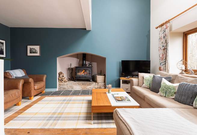 Relax and unwind in this beautiful living-room. The perfect way to finish the day.