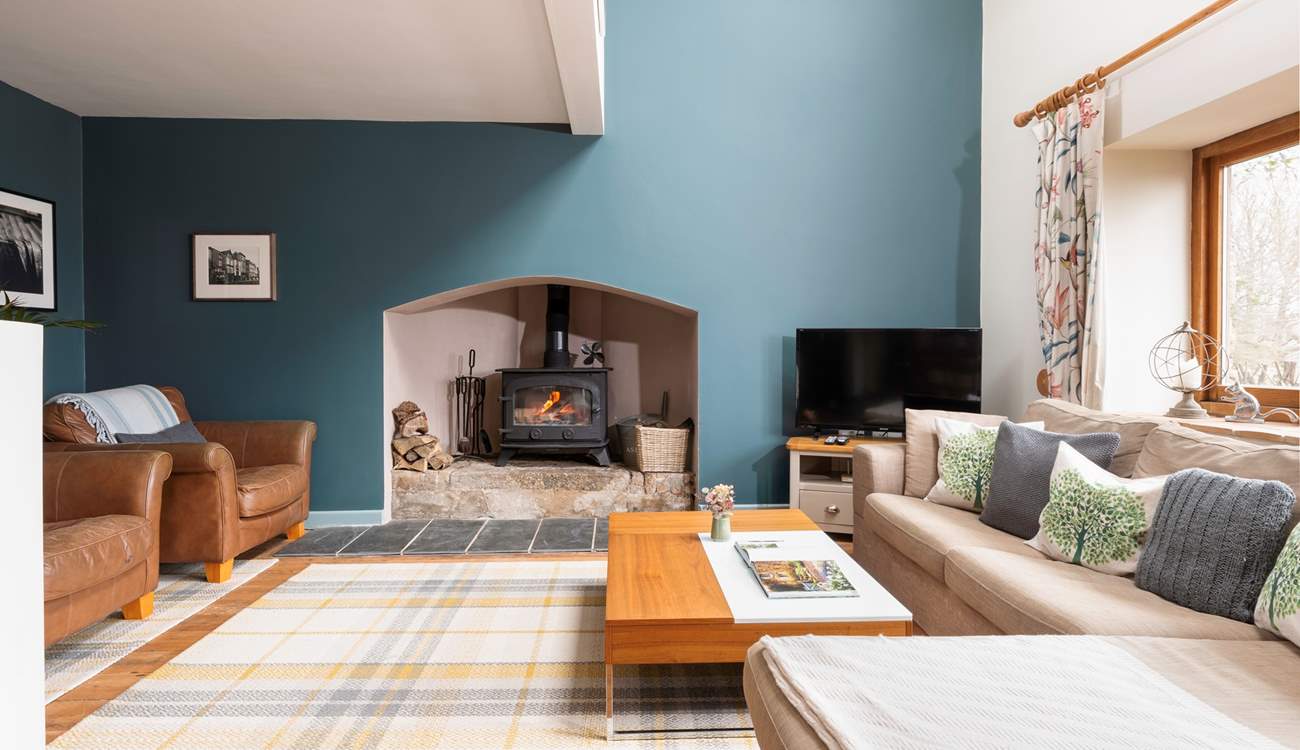 Relax and unwind in this beautiful living-room. The perfect way to finish the day.