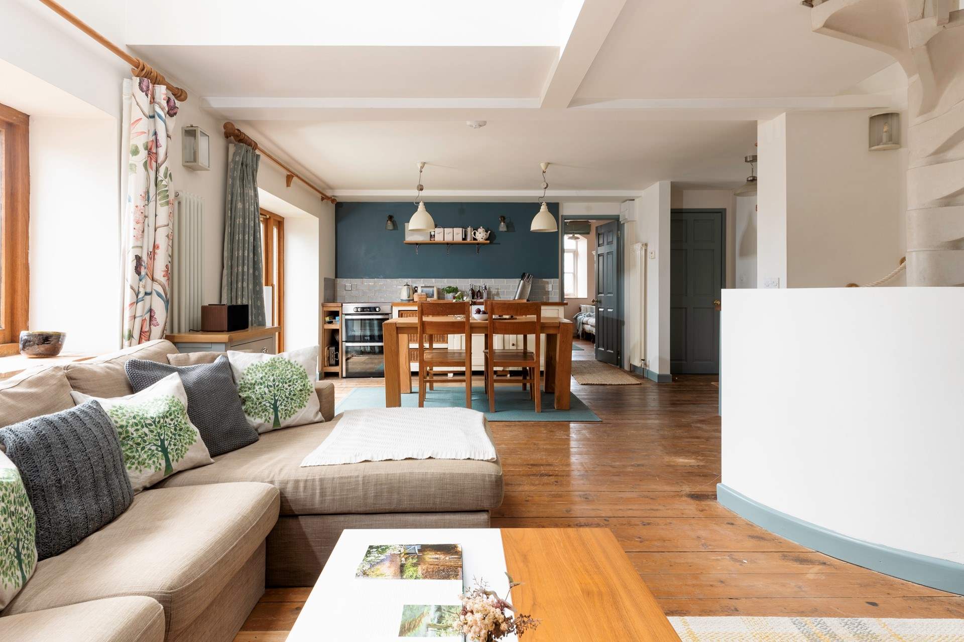 Looking into the kitchen and beyond from the living-room.