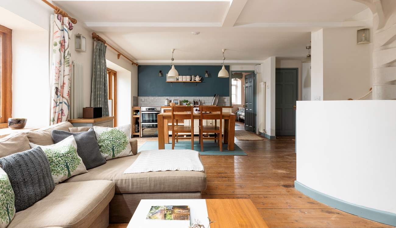 Looking into the kitchen and beyond from the living-room.