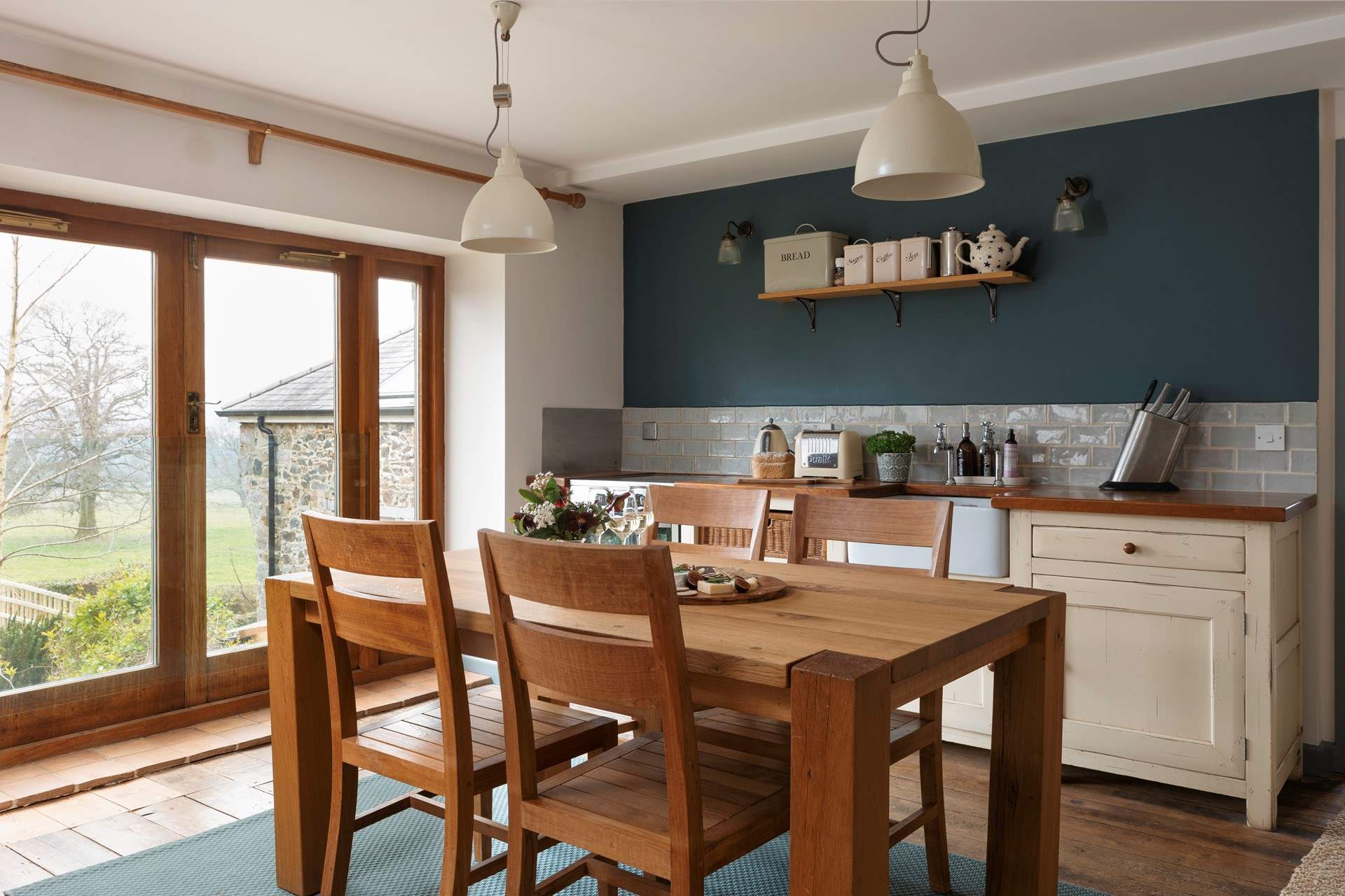 The kitchen is such a welcoming space, which leads into bedroom one.