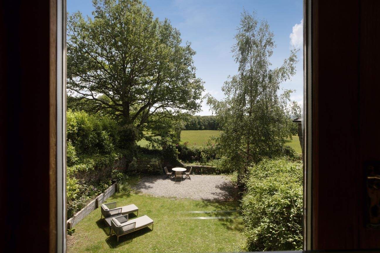 Stunning views over the garden and out over the rolling countryside can be enjoyed from the living areas.