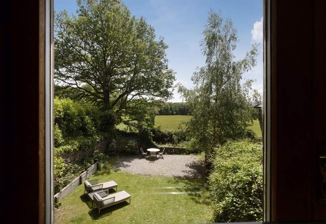 Stunning views over the garden and out over the rolling countryside can be enjoyed from the living areas.