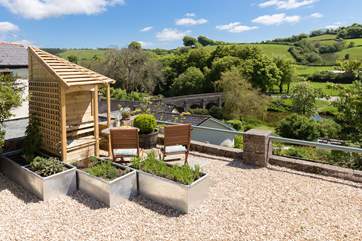 The views are quite simply stunning. There are two lovely seating-areas that make the most of it - at the front of the cottage, just across the little no-through lane and there is also a beautiful back garden.