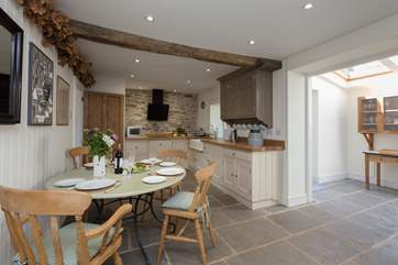 The large kitchen/dining-room has flagstone floors - ideal if you are bringing a dog.