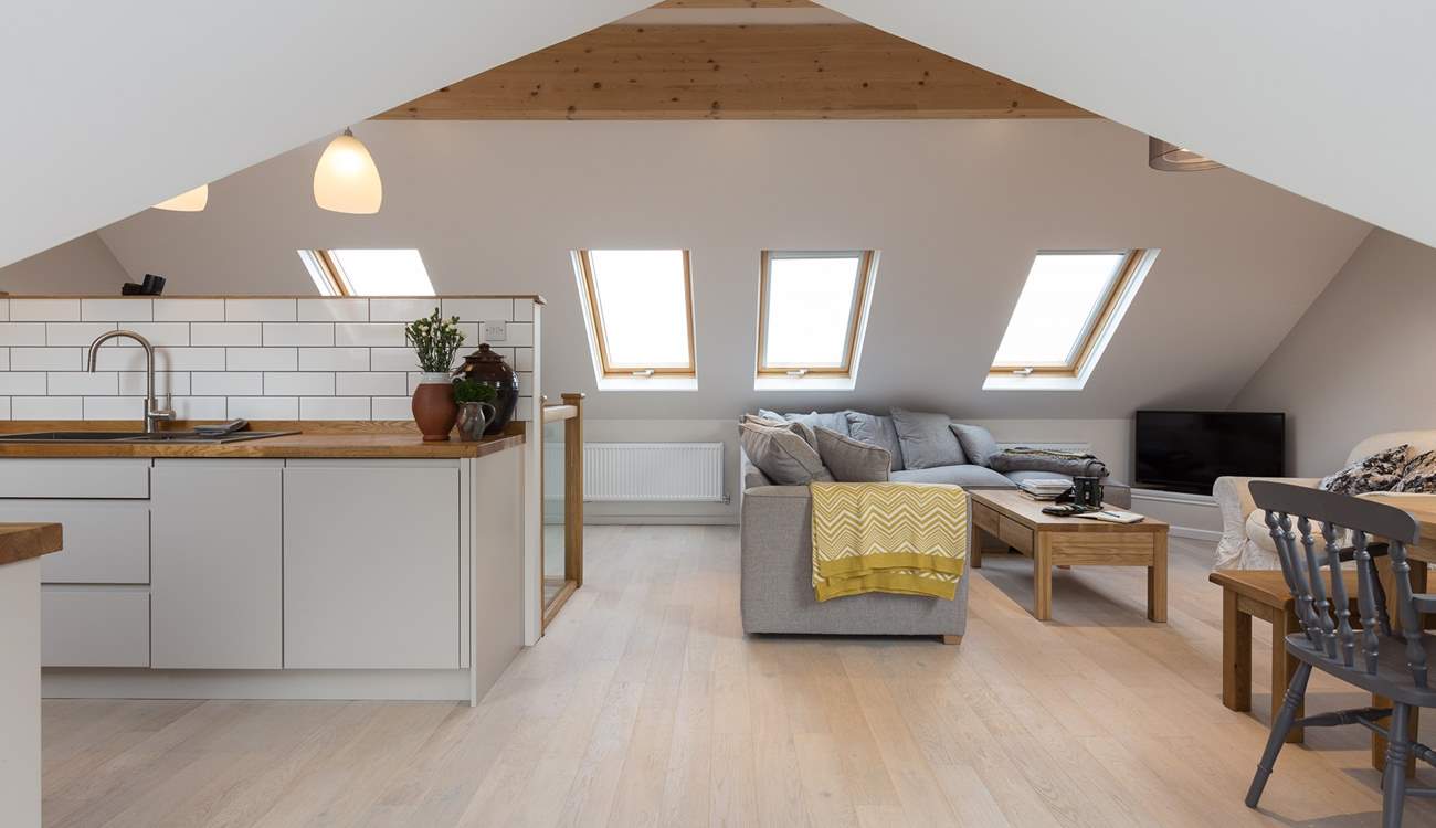 The spacious reverse level accommodation has been carefully designed so that whilst very sociable, there are clear zones for the kitchen, dining and seating areas.