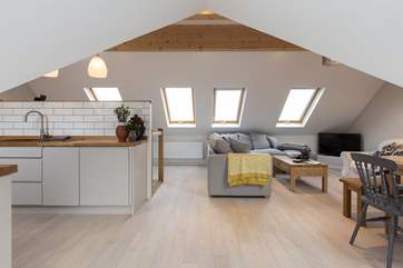 The spacious reverse level accommodation has been carefully designed so that whilst very sociable, there are clear zones for the kitchen, dining and seating areas.