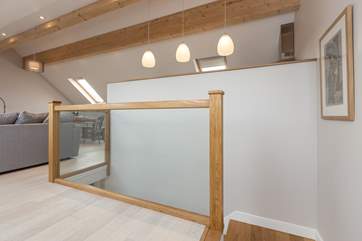 The stairs lead you up into the light-filled open plan first floor living space.