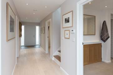The Willows has a wide hall that links the front and back doors and gardens. With stunning original artwork by local artists on all the walls, this is a really special place to stay.