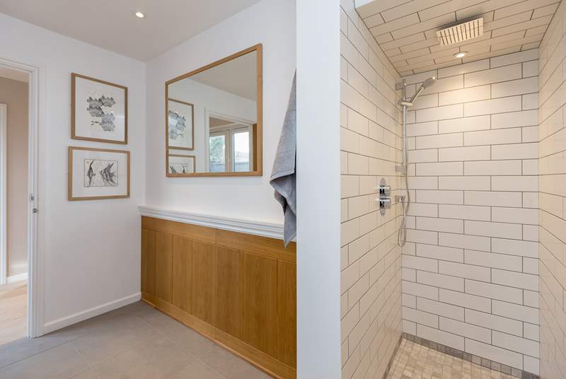 The walk-in shower is cleverly designed along the lines of a wet-room.