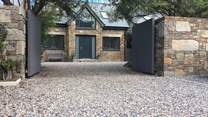 The Willows is a lovely bespoke detached house - an absolute labour of love, with front and rear outside space to enjoy. There is a lawn just inside the gates to the right.