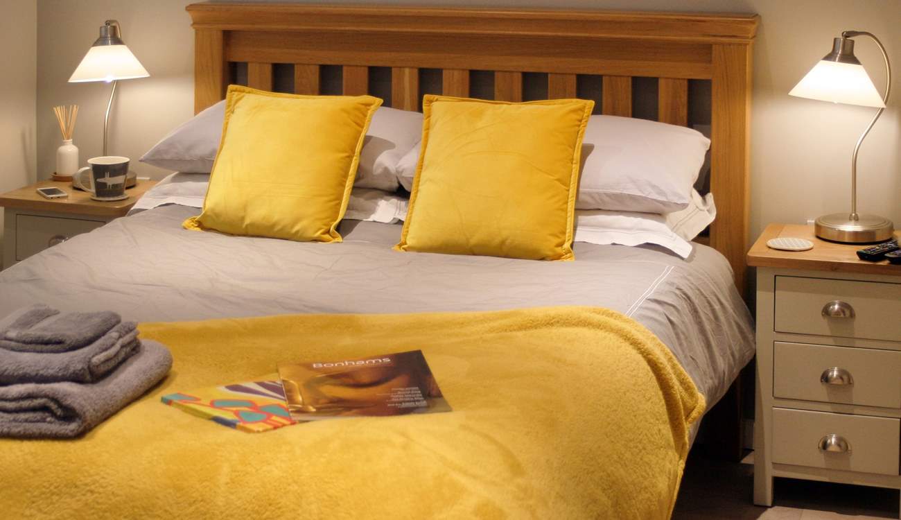 This is one of the two wonderful double bedrooms on the ground floor, a tranquil and understated, stylish room to enjoy.