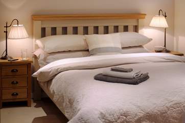 The calming second bedroom on the ground floor.