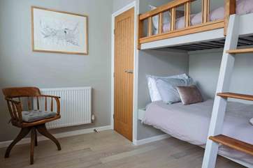 This view of the third bedroom gives you a good idea of how much space there is. The fitted wardrobe offers extra space for the other bedrooms too.