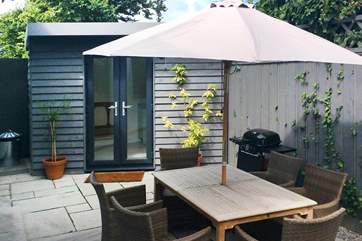 There is a lovely enclosed and totally private courtyard to enjoy at the back of The Willows, complete with summer-house/utility-room - such a well thought out and useful space for you.