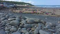 Known for its child-friendly beach with lifeguards on duty throughout the summer.