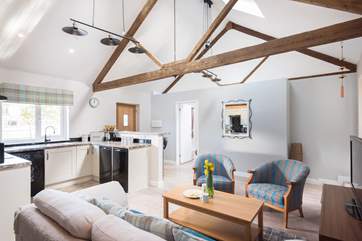 The open plan living-room, with the double bedroom en suite at one end and the twin room at the other.
