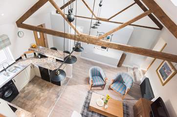 Looking down over the living-room from the snug.