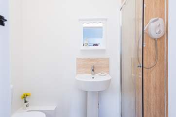 The en suite shower-room has a large double cubicle.