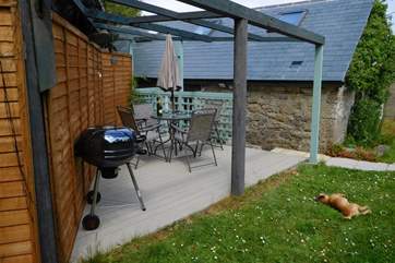 There is a raised deck in the garden, this can be accessed on the level through the garden gate or up a small flight of steps from the cottage.