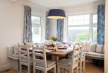 Lovely large dining-table with plenty of space for family meals.