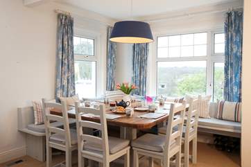 Lovely large dining-table with plenty of space for family meals.